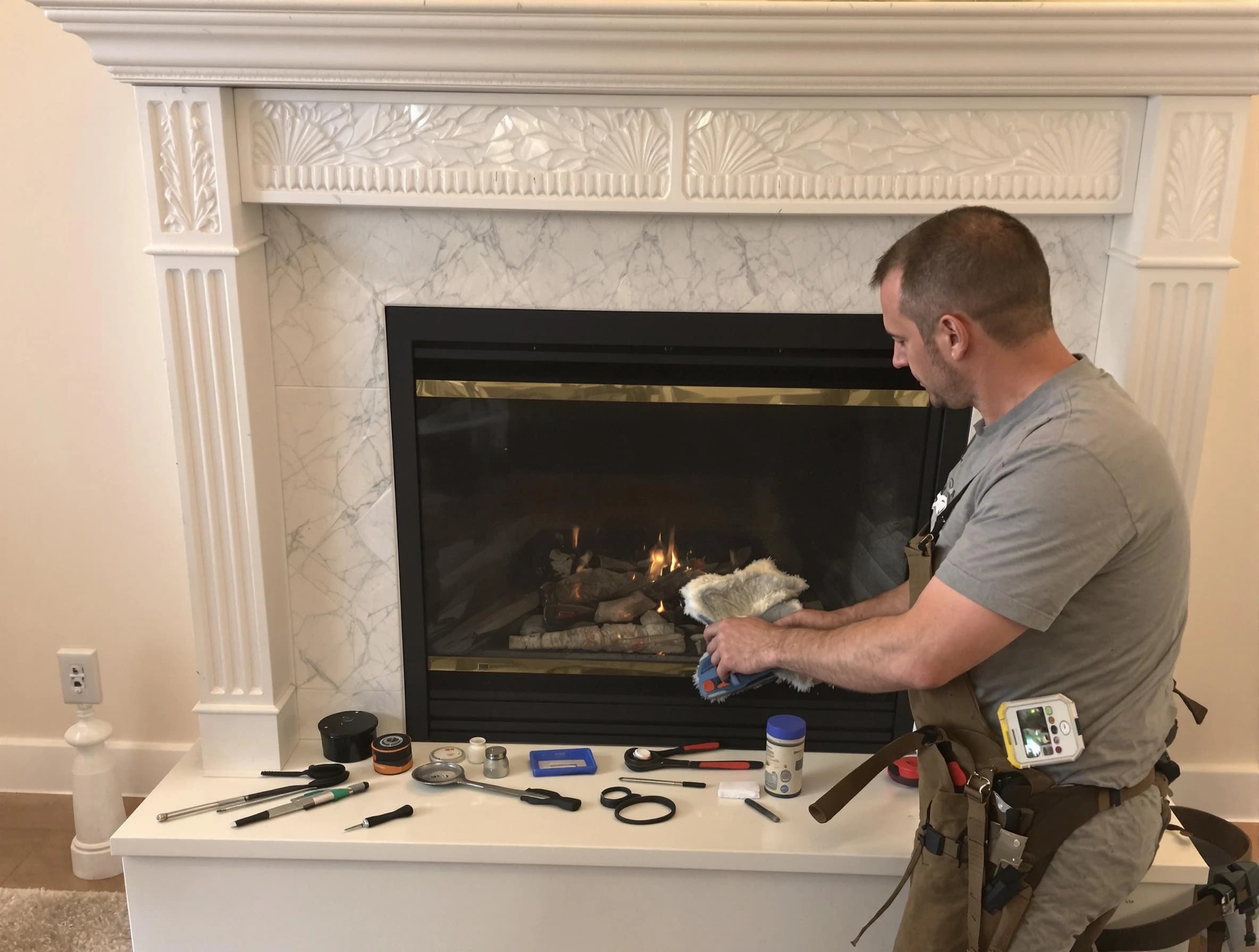 Litchfield Park Chimney Sweep performing fireplace maintenance in Litchfield Park, AZ